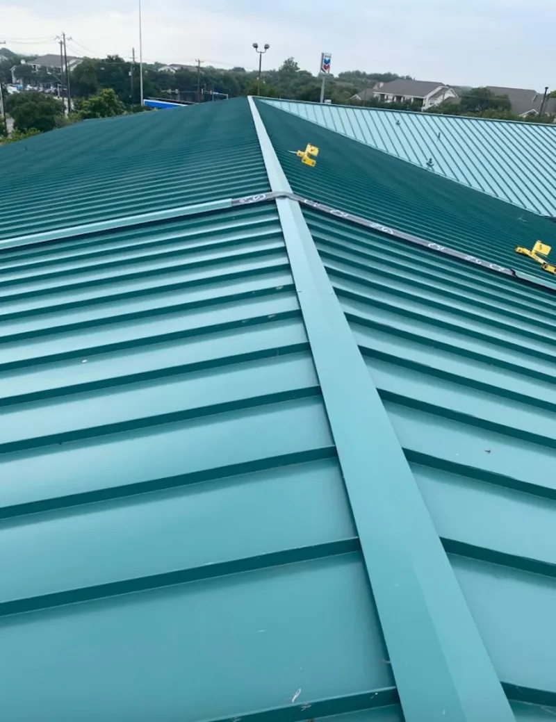 Green commercial metal roof ridge and valley for Metal Roof Repair in Bostonia
