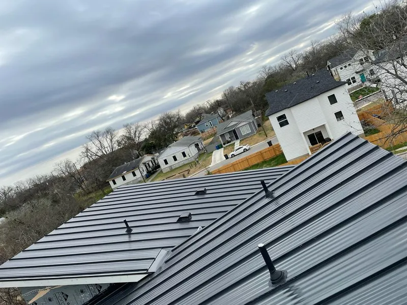 Standing seam metal roof panels with vents for Skylight Repair in Bostonia